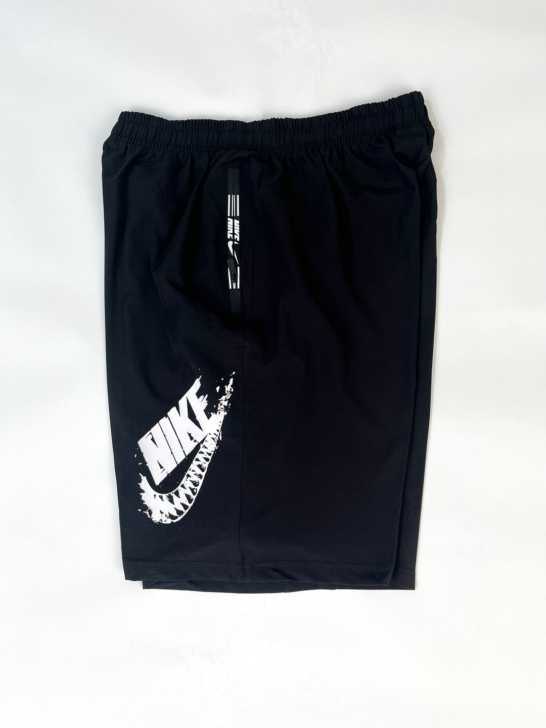 Nike logo splash shorts in black