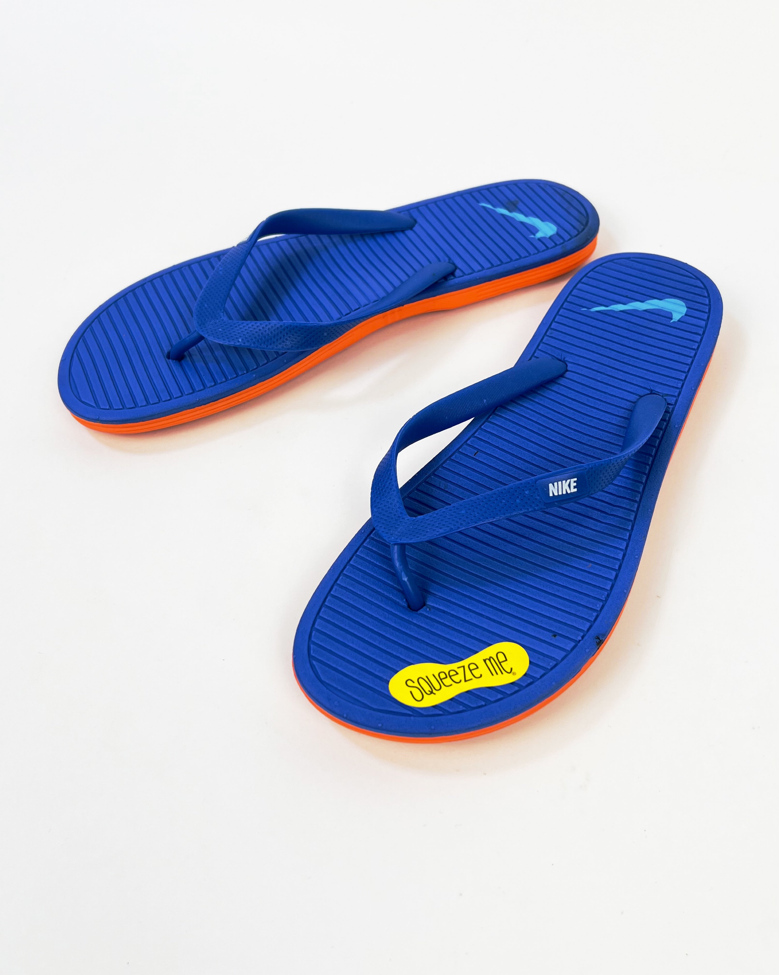 Nike squeeze flip flops hotsell