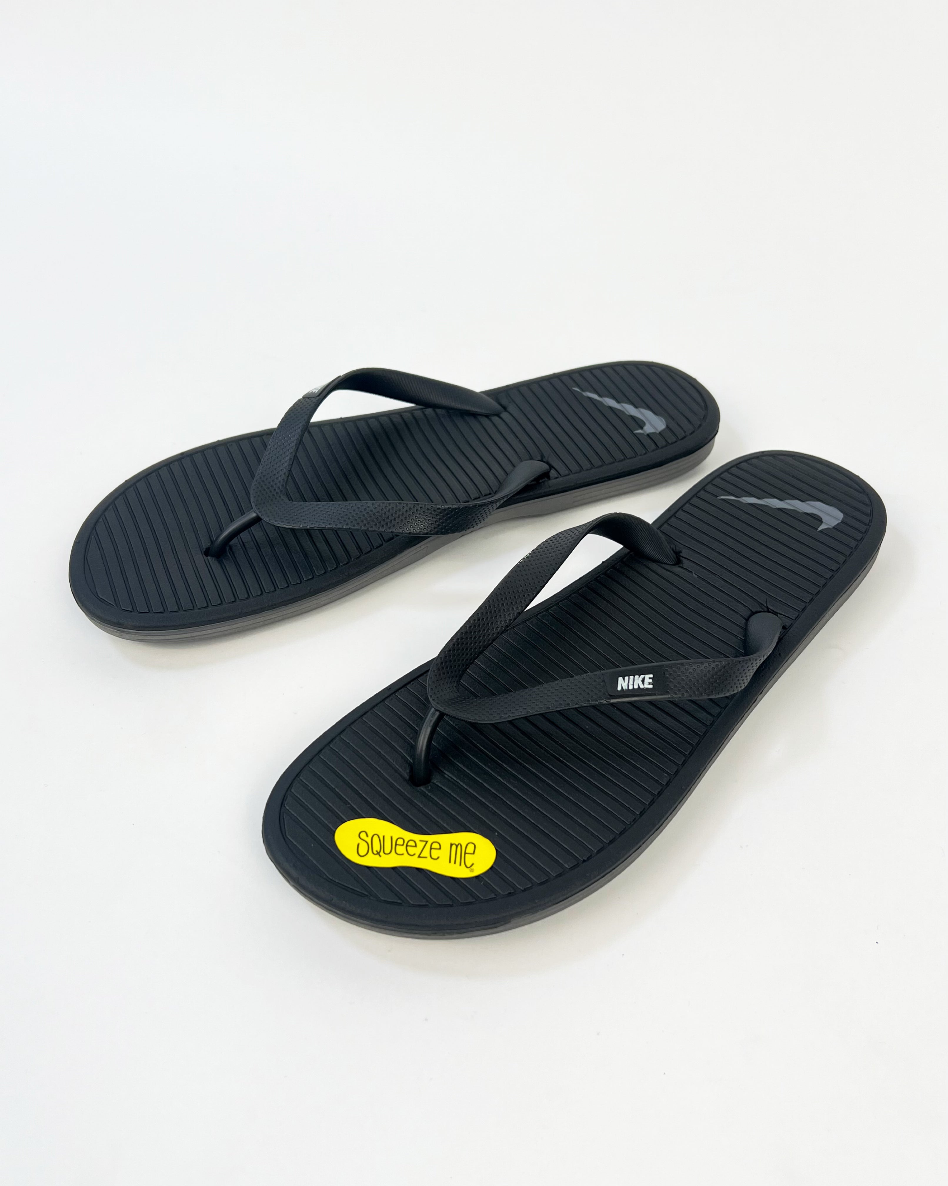 Nike Solar Soft Flip Flop Slides in black Garmisland