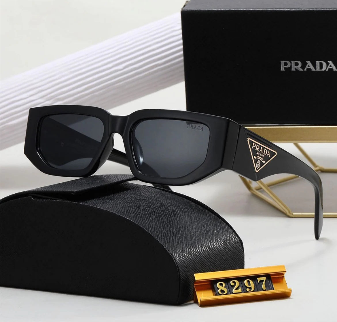Prada Slate Gold Symbole Sun glasses in black