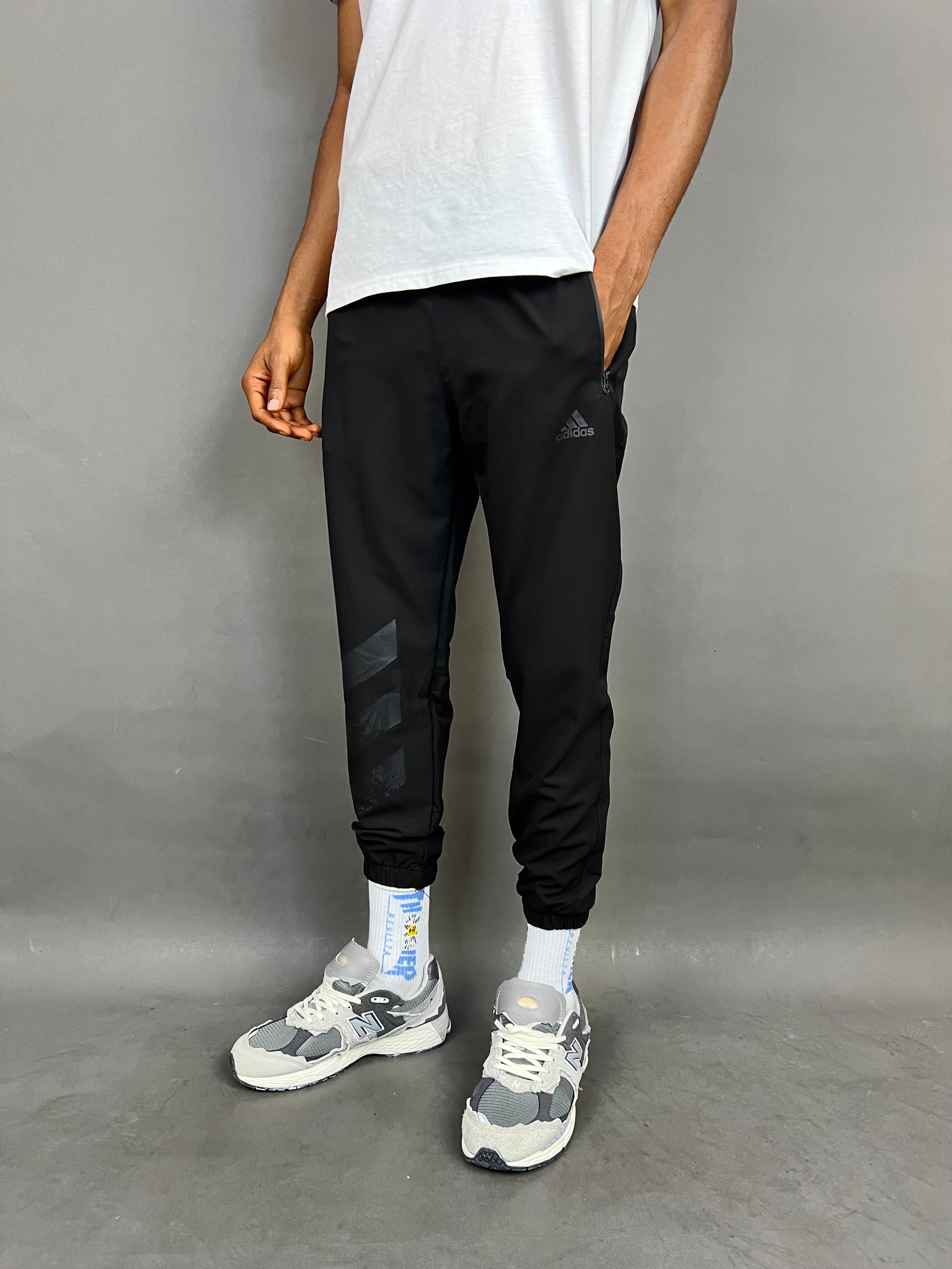 Adidas cropped jogger pants in black