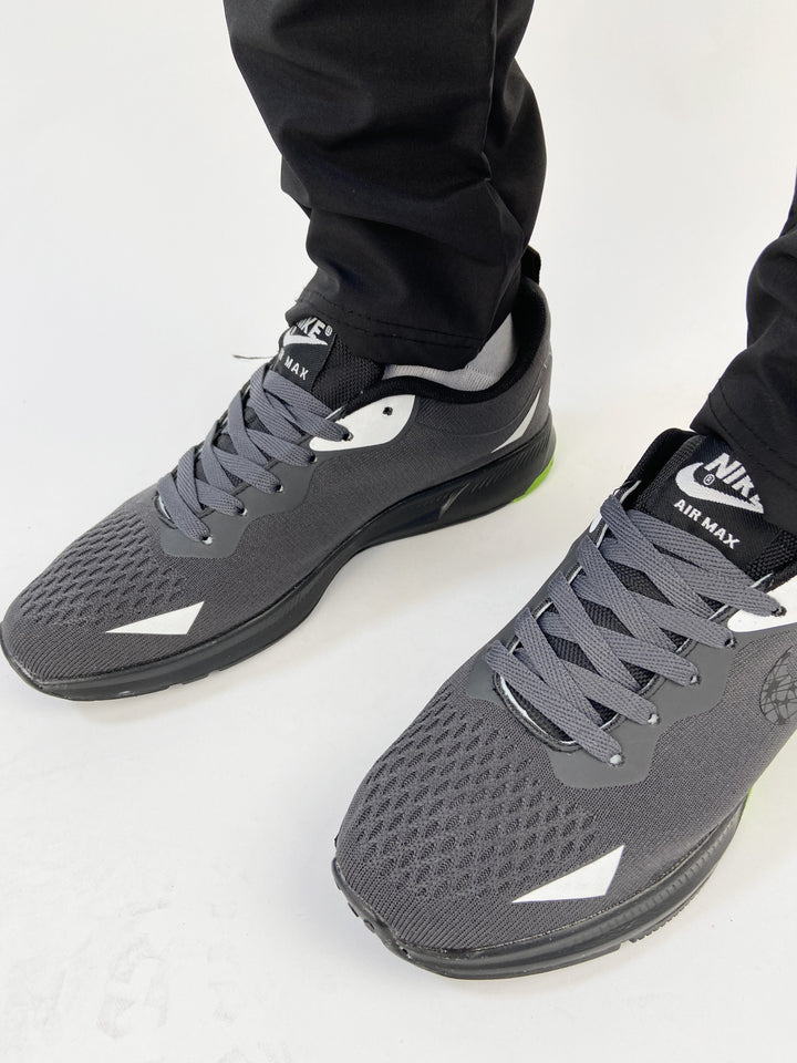 Nike air max trainers in black&lime sole