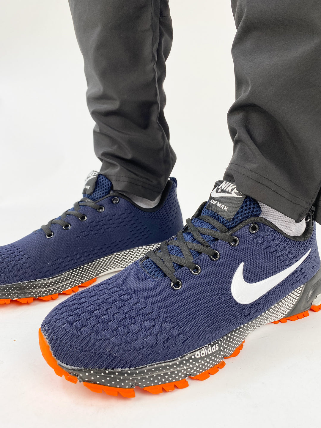 Nike air max navy blue trainers with waffle orange sole