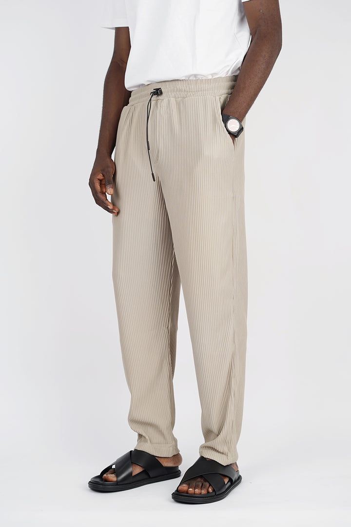 Spruce pleated pants with toggle drawstring in beige