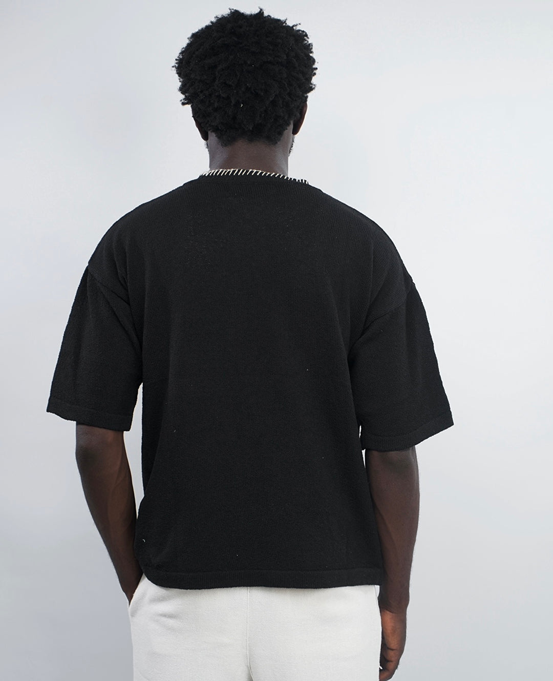 GIESTO knit polo with stitching in black