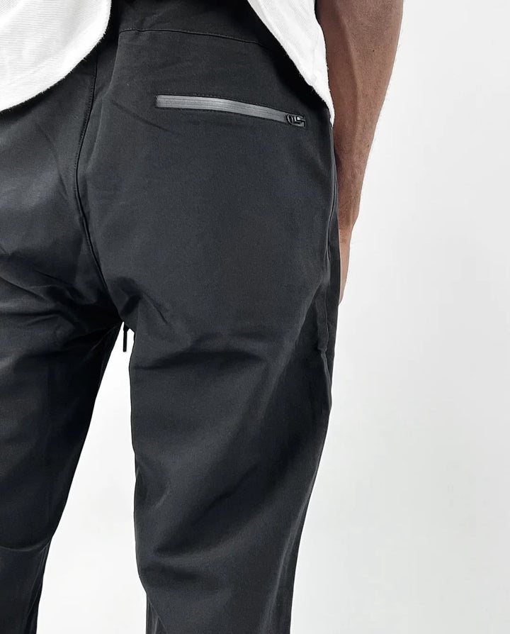 Under armour logo track pants in black