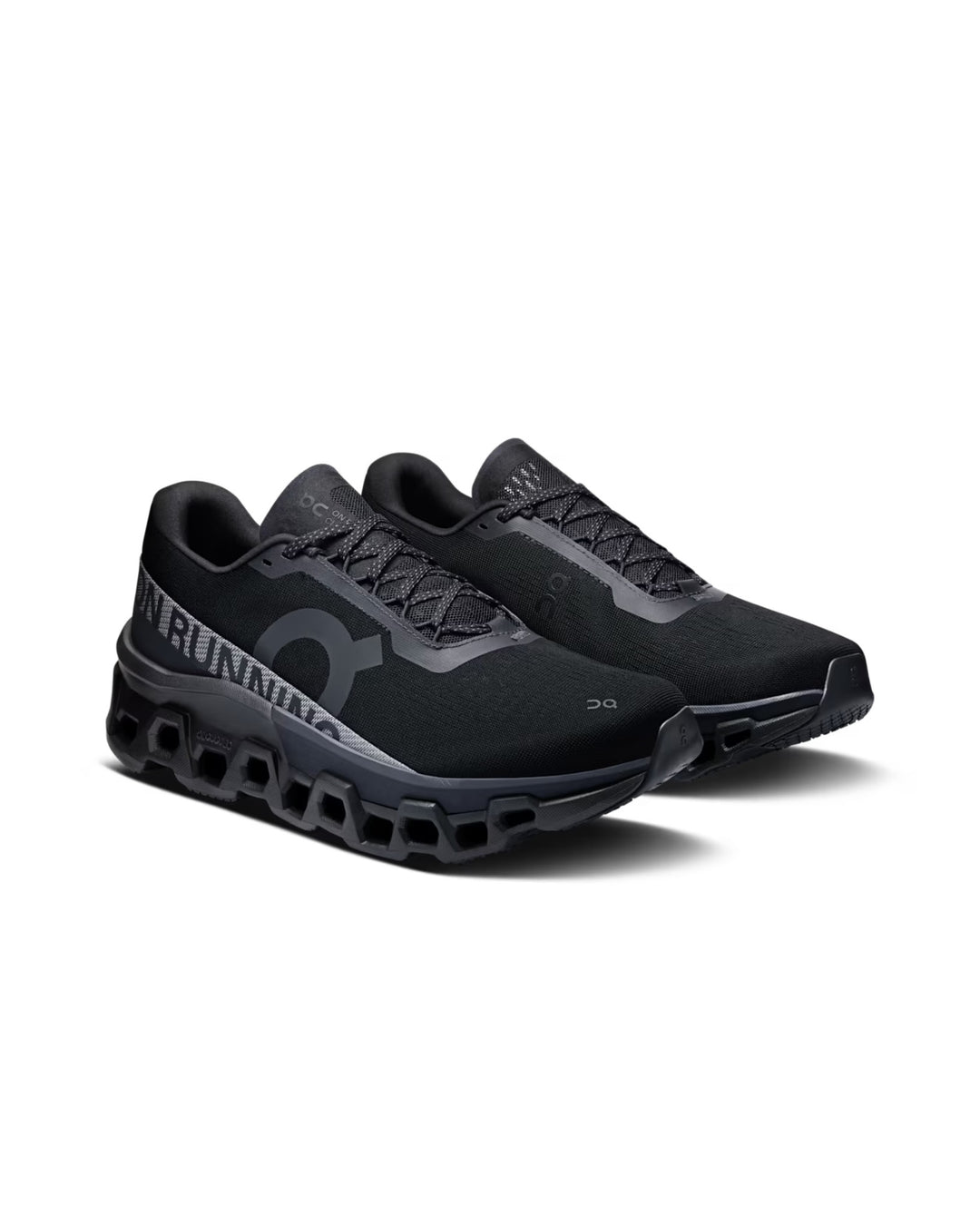 ON Cloudmonster running trainers in black