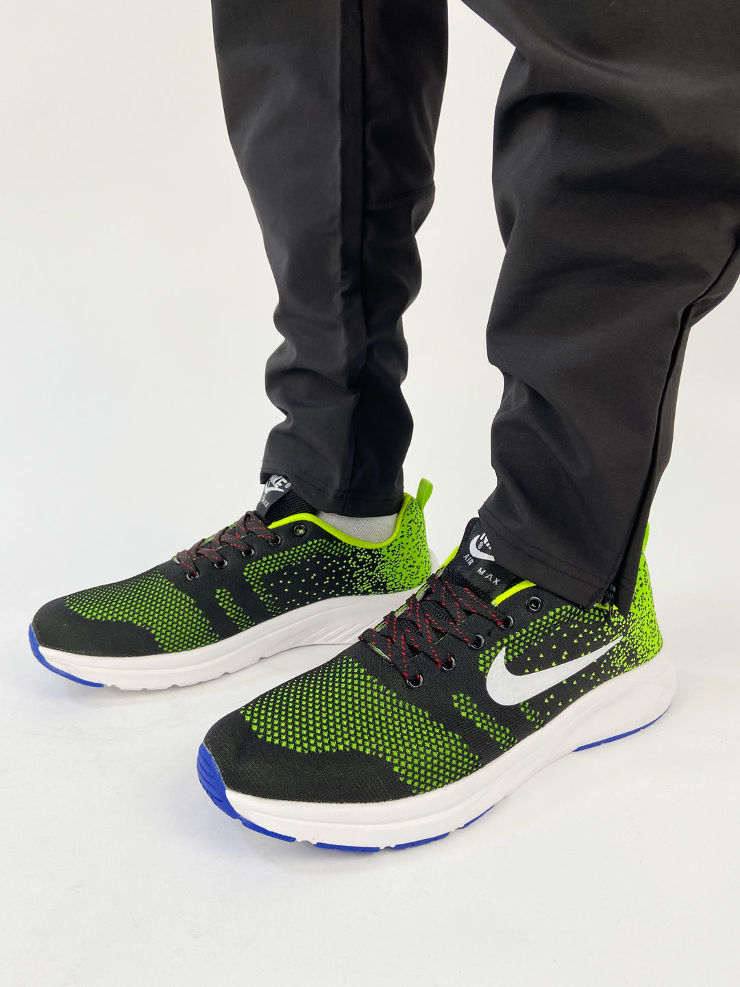Nike air max trainers in net green with blue and white soles