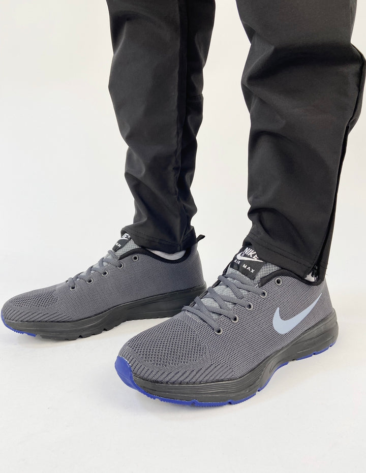 Nike air max trainers in grey with dark blue soles
