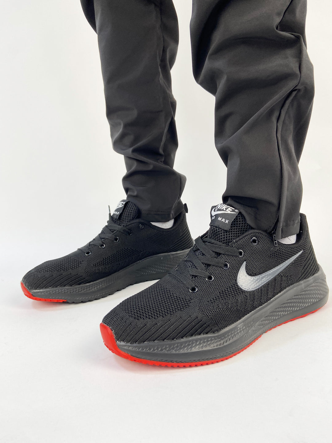 Nike air max knit trainers with black&red sole