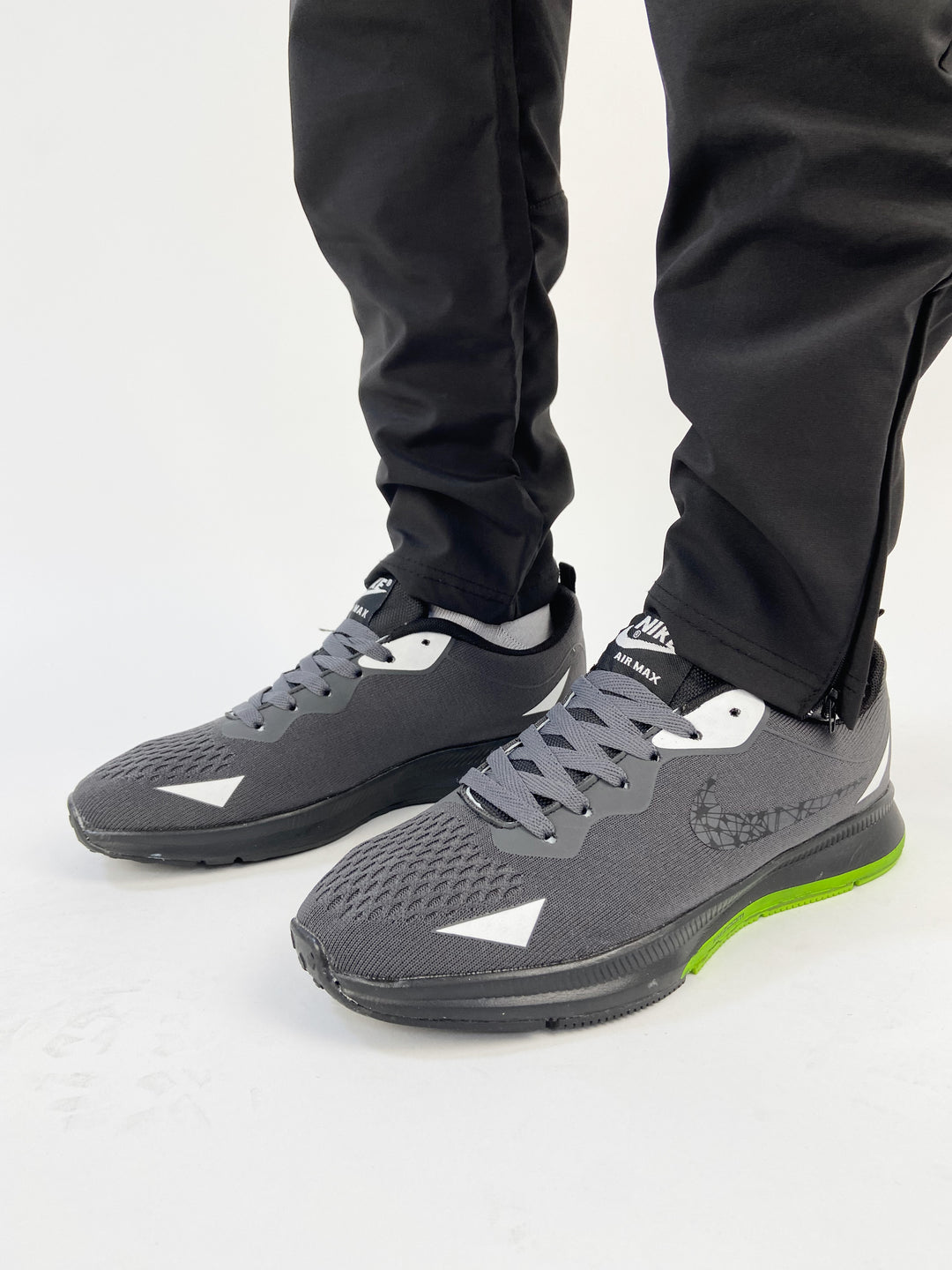 Nike air max trainers in black&lime sole