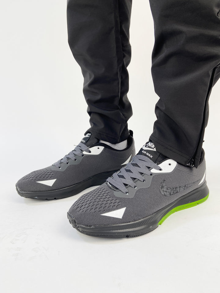 Nike air max trainers in black&lime sole