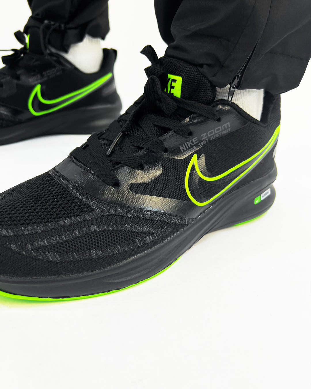 Nike zoom trainers in black and green