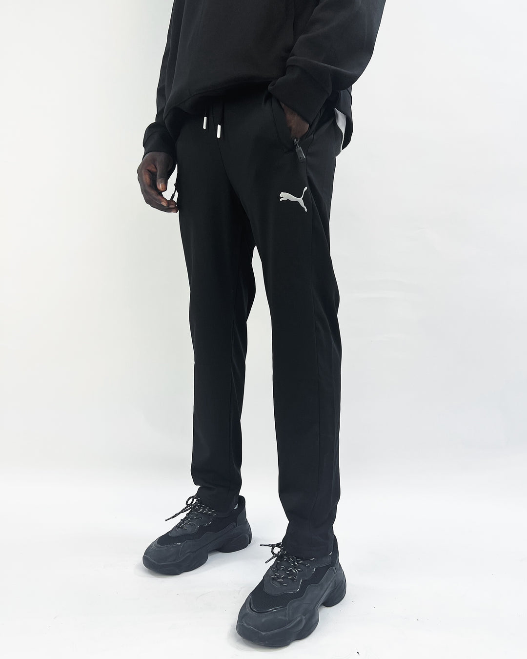 Puma reflective logo trackpants