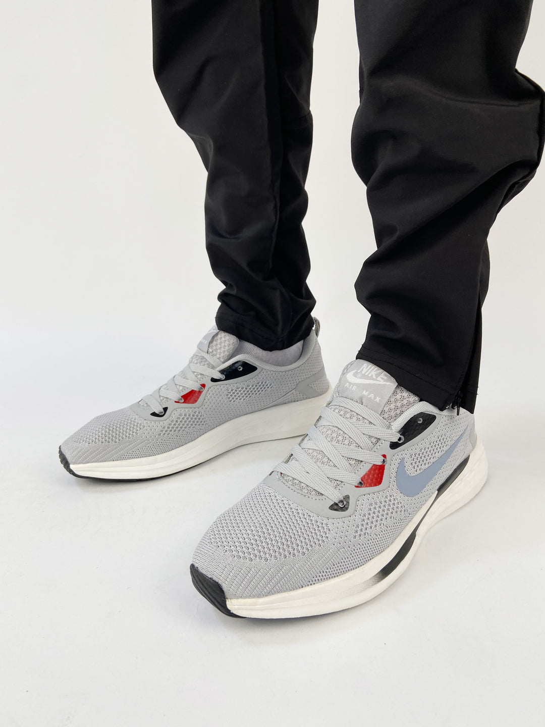 Nike air max light grey trainers with red highlights