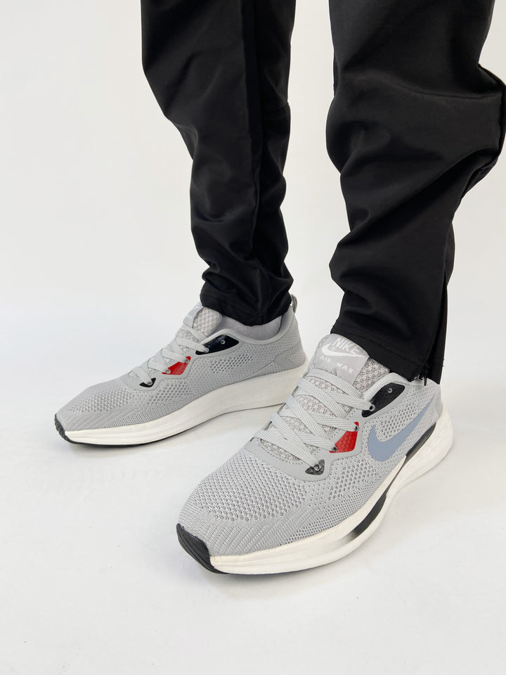 Nike air max light grey trainers with red highlights