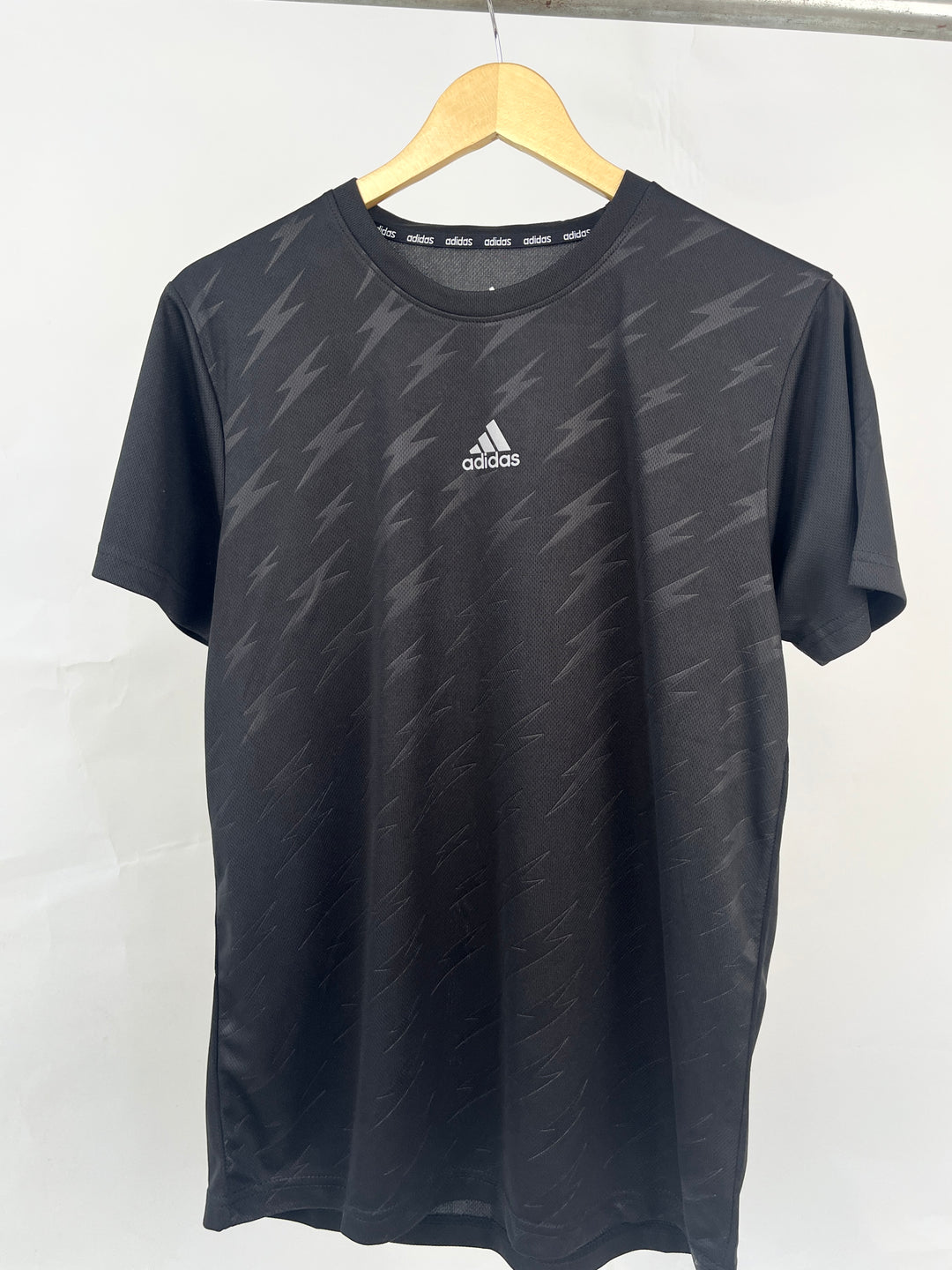 Adidas middle logo Lightning sports t-shirt in black