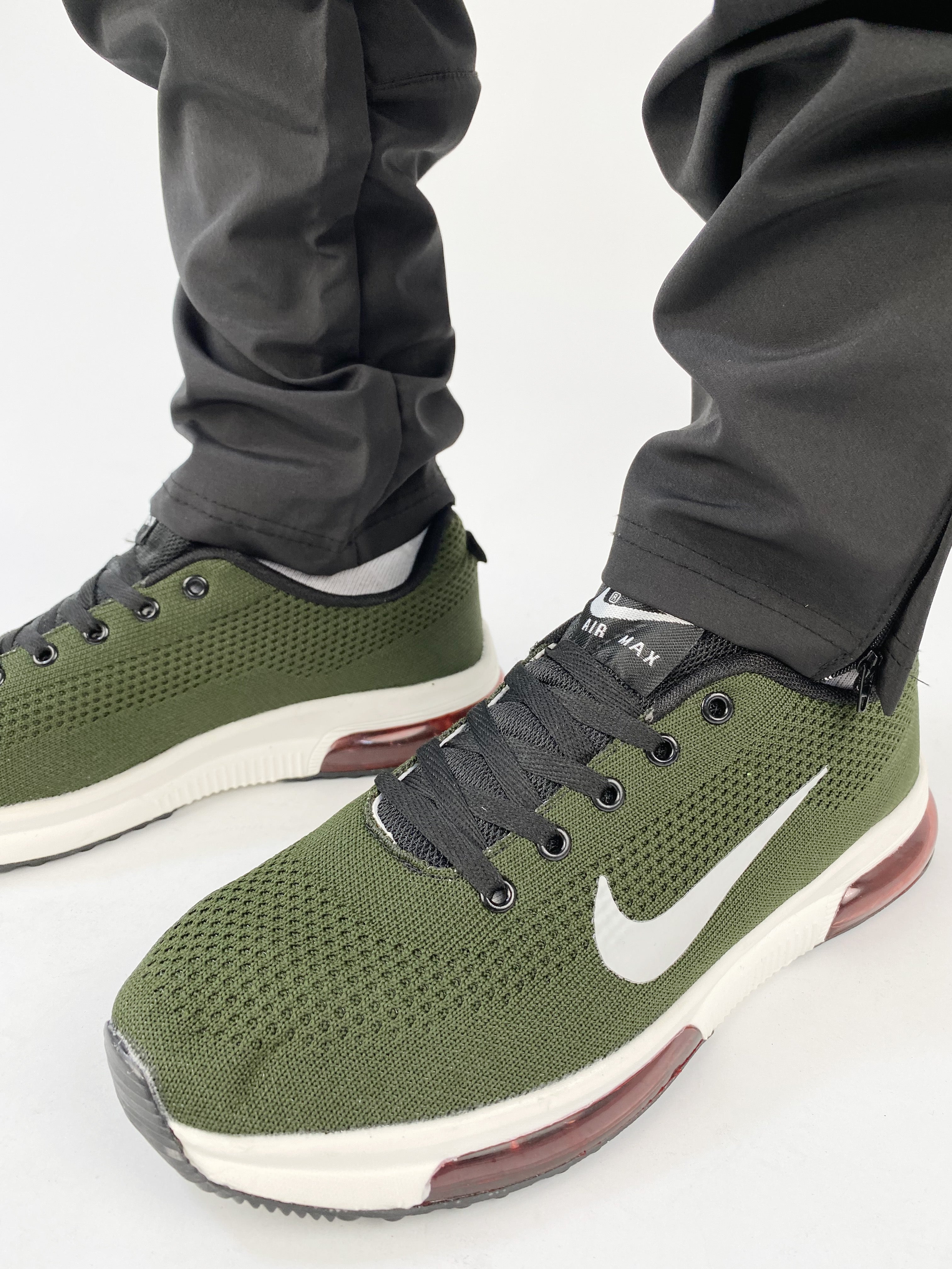 nike red sole trainers