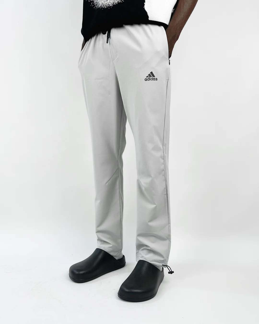 Adidas black logo track pants in grey