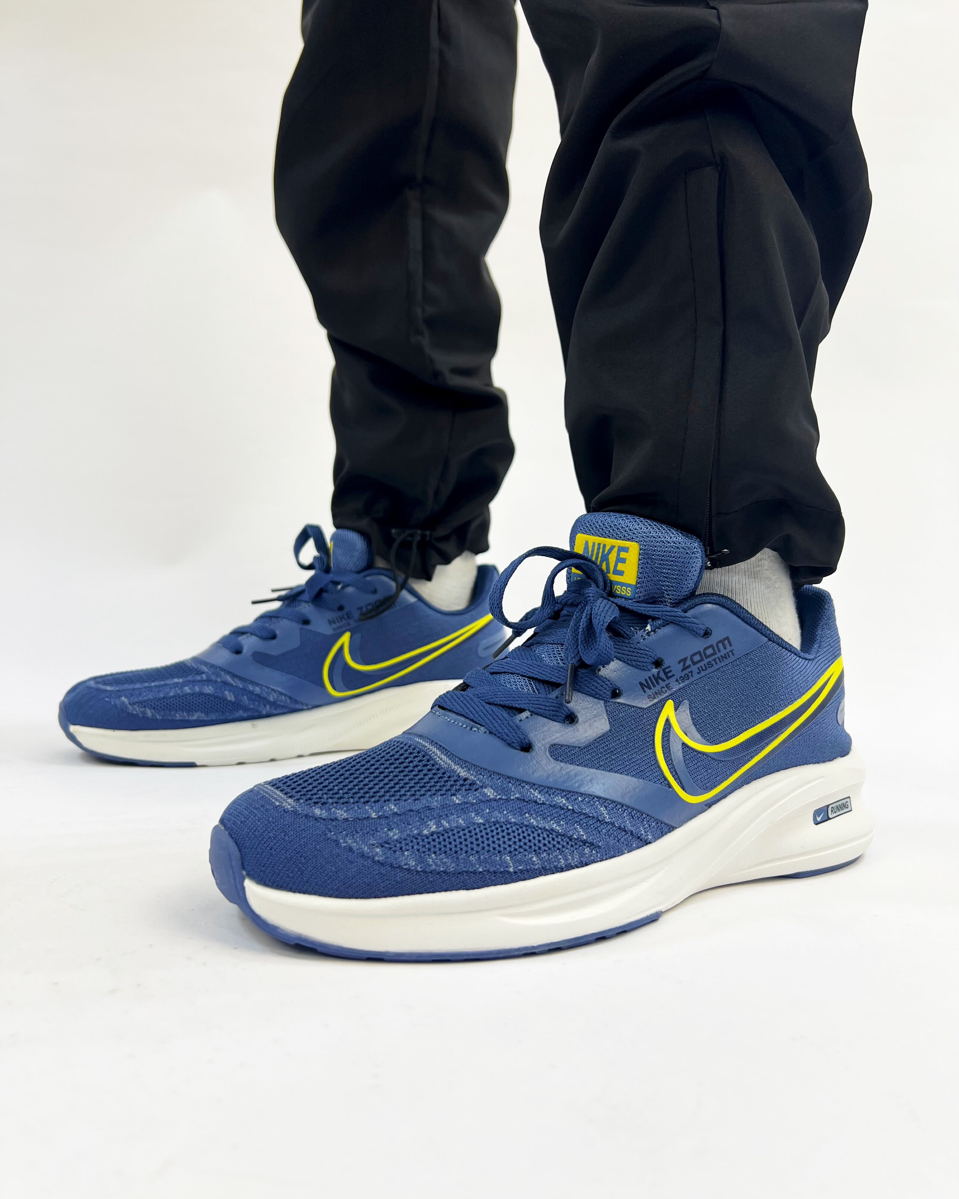 Blue and on sale yellow nike trainers