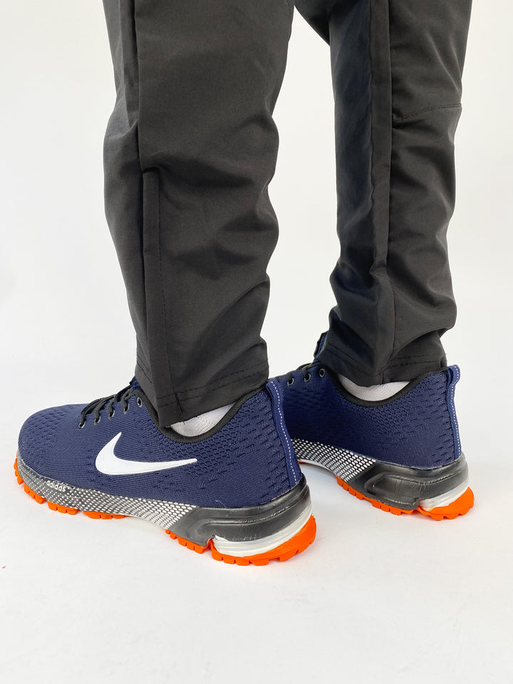 Nike air max navy blue trainers with waffle orange sole