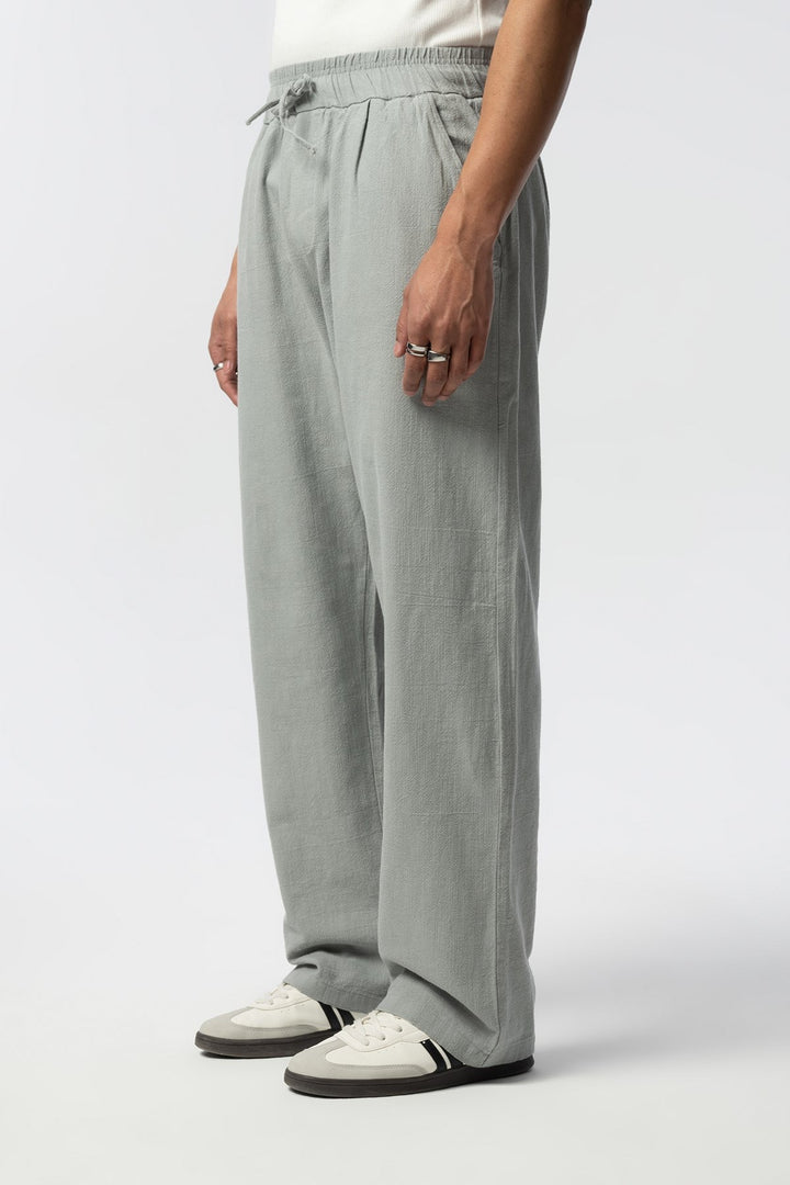H&M COTTON/LINEN RELAXED FIT TROUSERS IN LIGHT GREEN