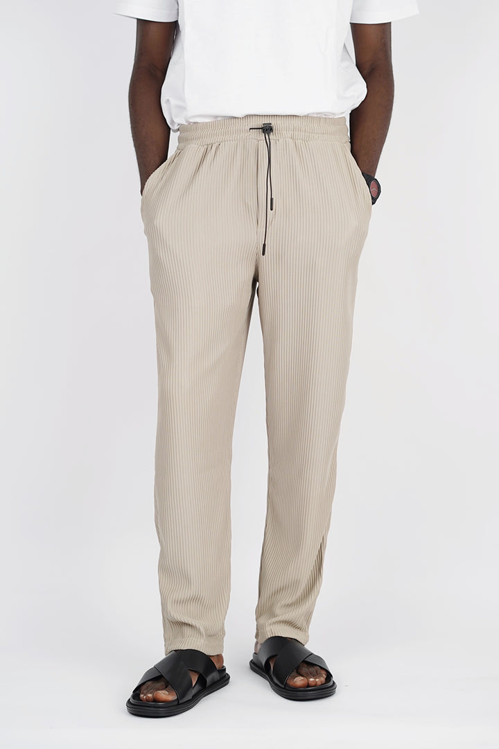 Spruce pleated pants with toggle drawstring in beige