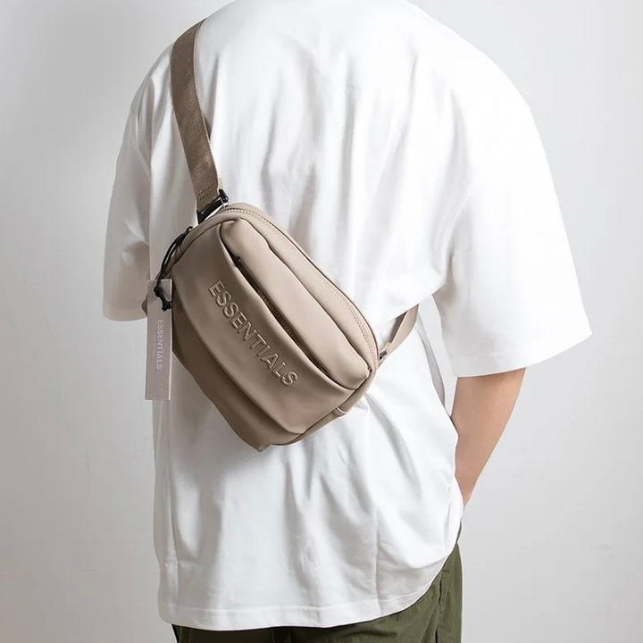 Essentials cross bags in cream