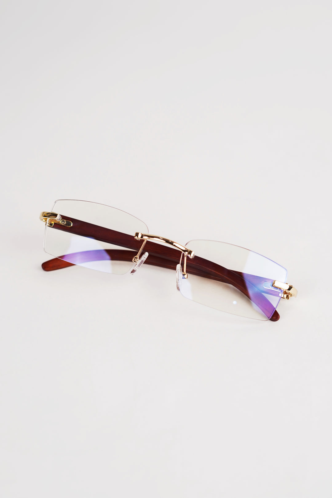 Buffalo Horn Rimless Wood Frame Sun glasses in Crystal
