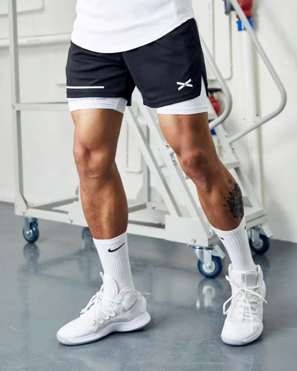 Sports double layered compression shorts in black and white