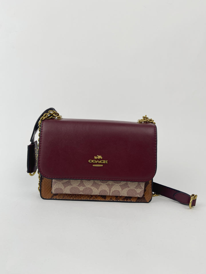 Mini coated canvas chain purse in burgundy
