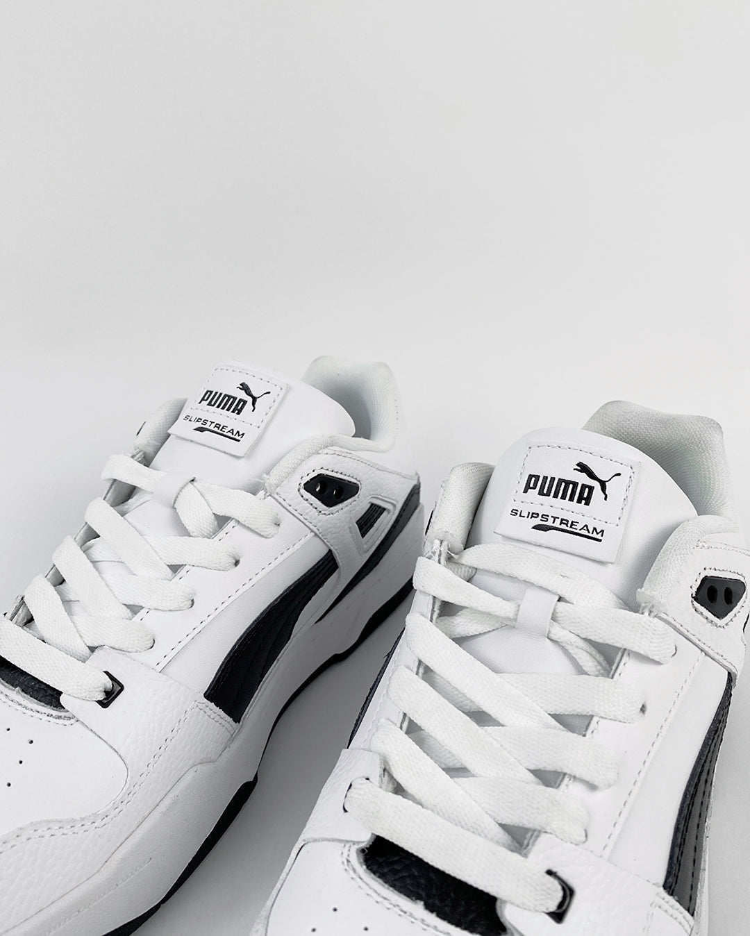 Puma Slipstream Trainers in Black and White