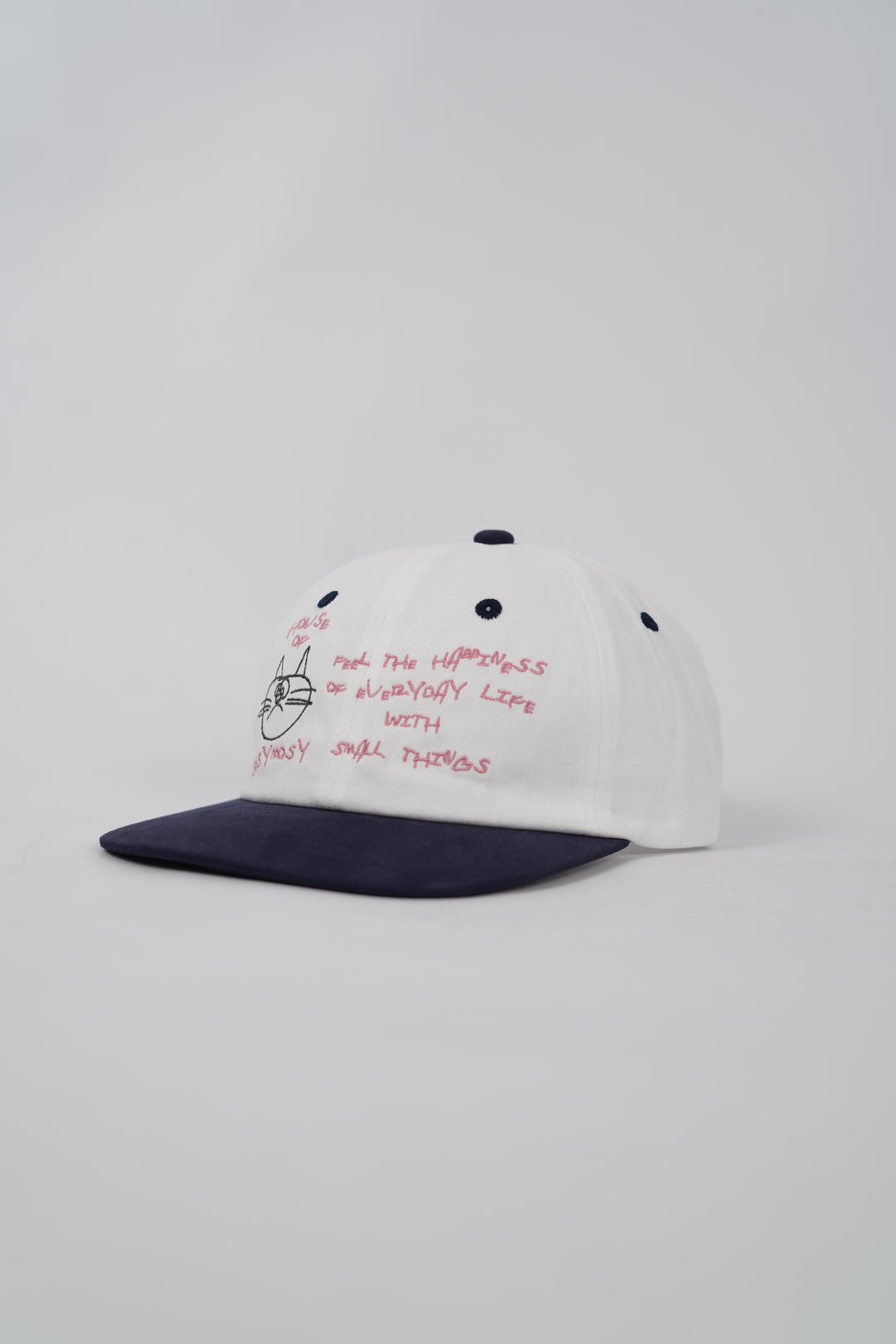 House of Cosymosy Cap in Ivory and Navy
