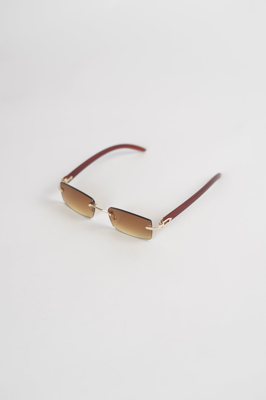 Buffalo Horn Rimless Wood Frame Sun glasses in brown