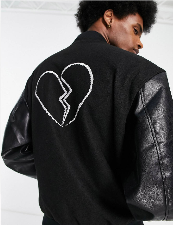 Oversized Montana varsity bomber with faux leather sleeves with back print in black