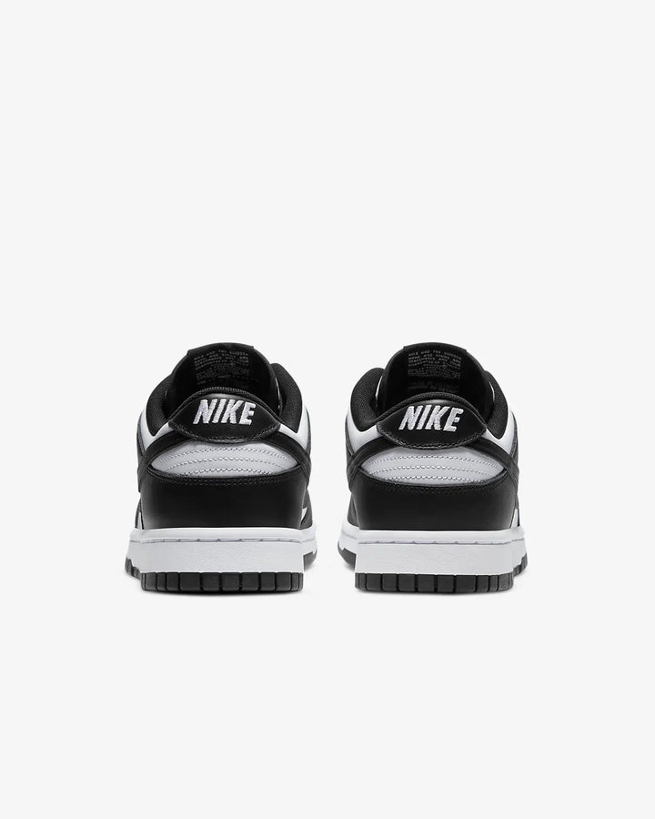Nike Dunk Low Retro Trainers in black and white