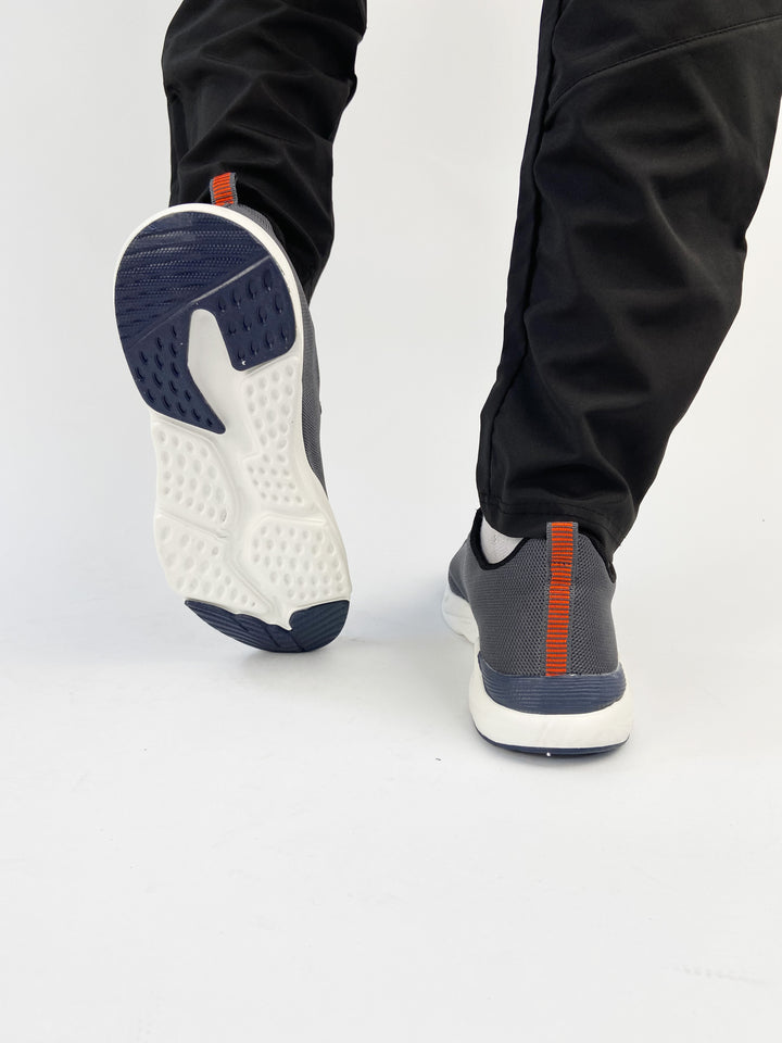 Nike air max trainers with blue logo and orange  back tab