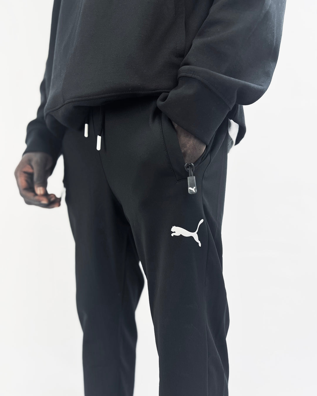 Puma reflective logo trackpants