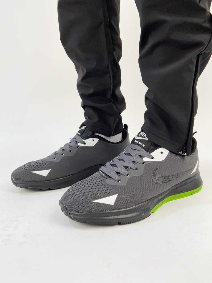 Nike air max trainers in black&lime sole