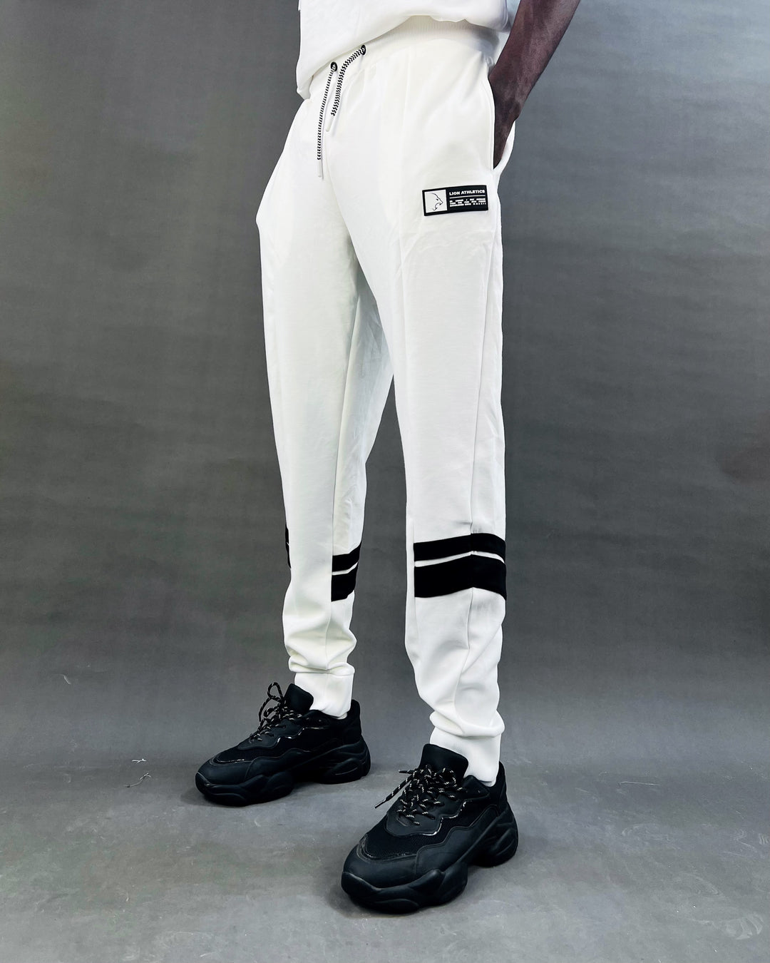 IQ double stripe jogger pants in white