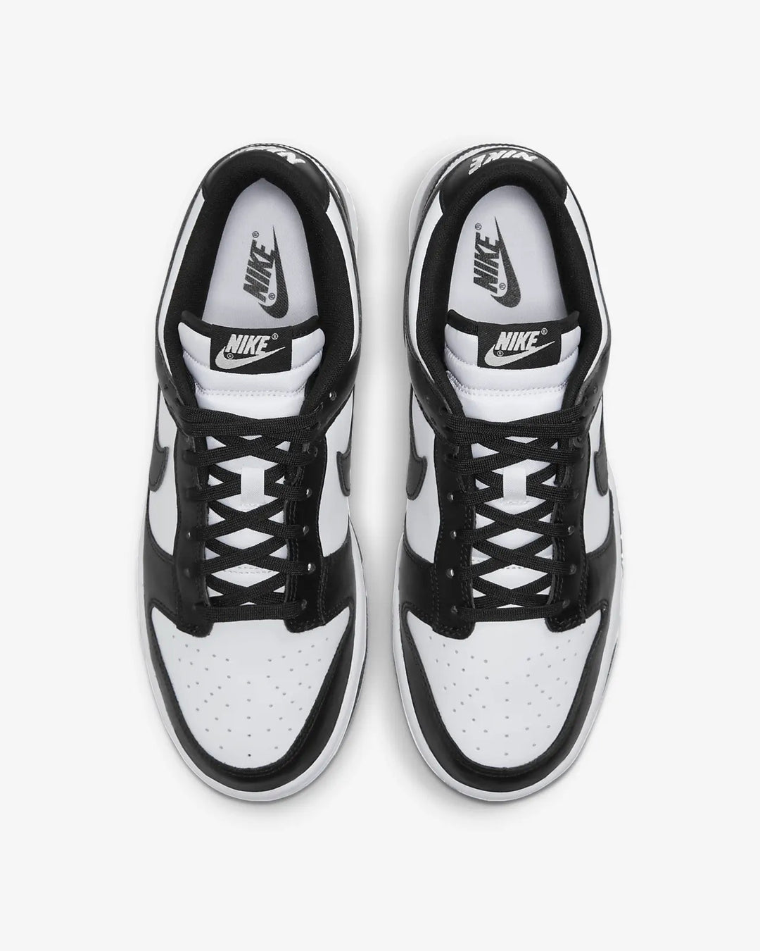 Nike Dunk Low Retro Trainers in black and white