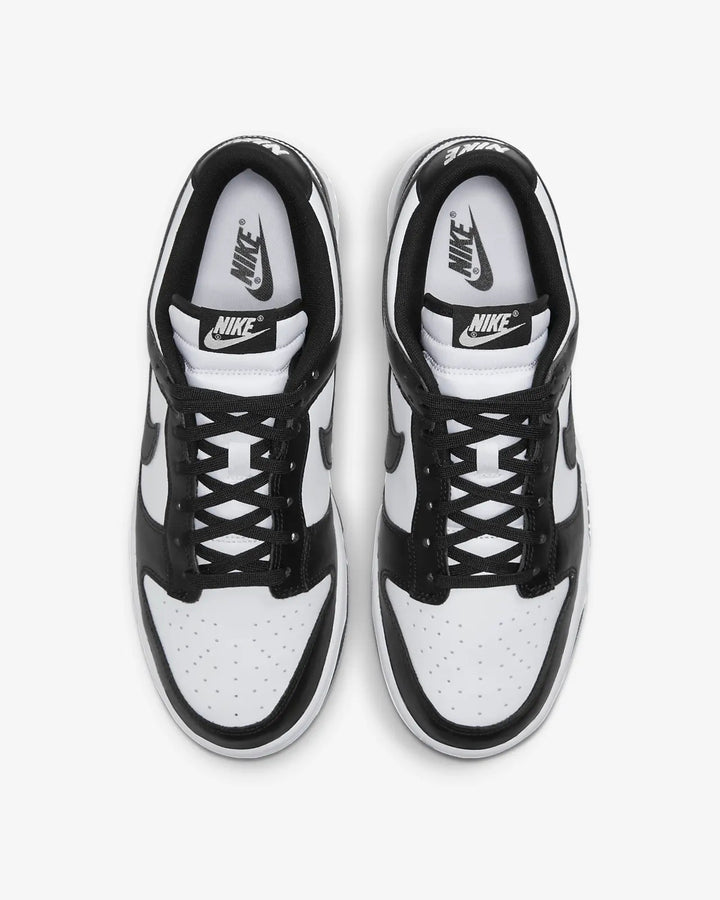 Nike Dunk Low Retro Trainers in black and white