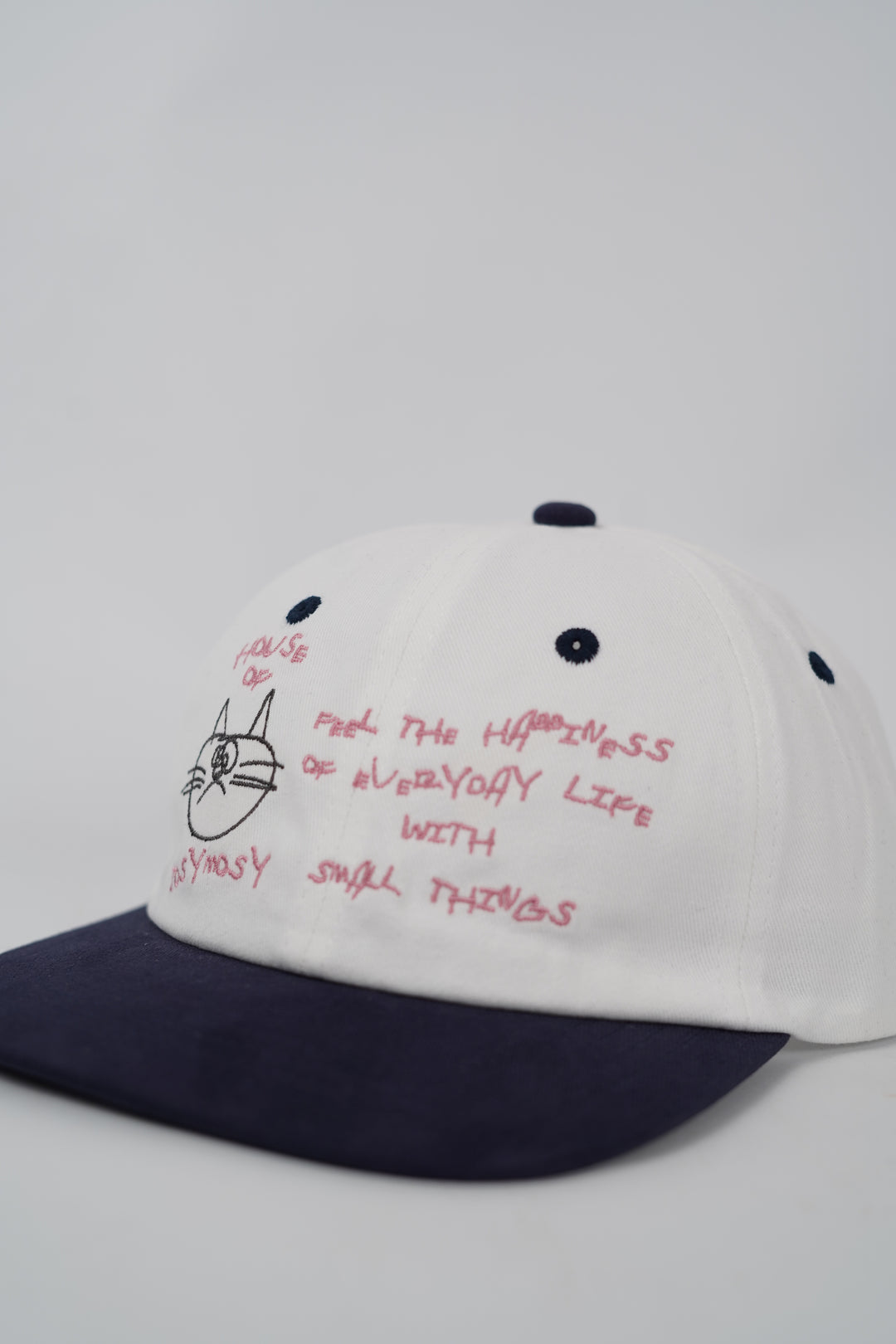 House of Cosymosy Cap in Ivory and Navy