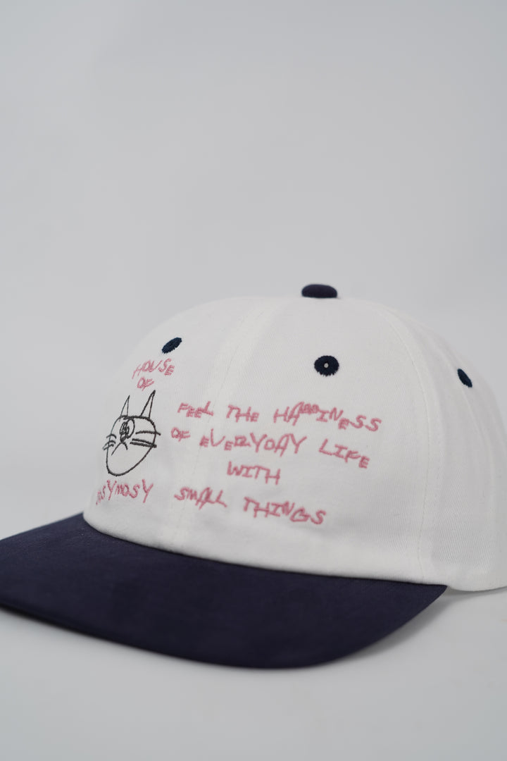 House of Cosymosy Cap in Ivory and Navy