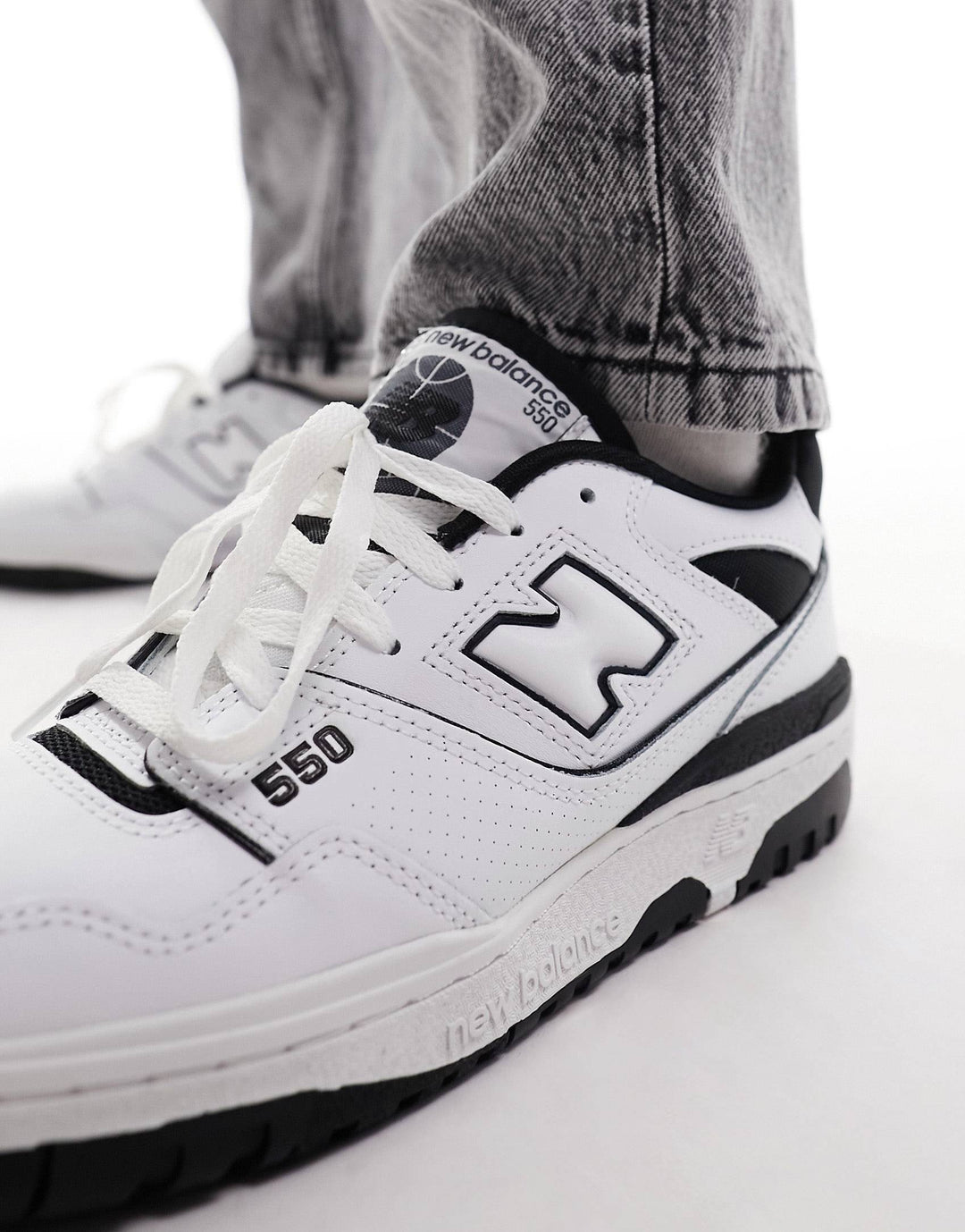 New Balance 550 trainers in black and white