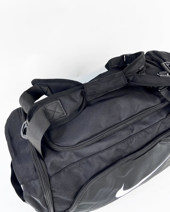 Nike big logo swoosh duffel bag in black