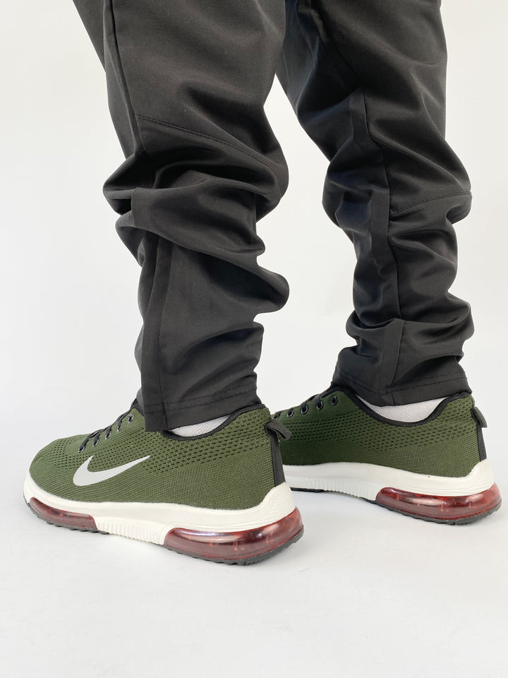 Nike air zoom textured green trainers with black and red sole