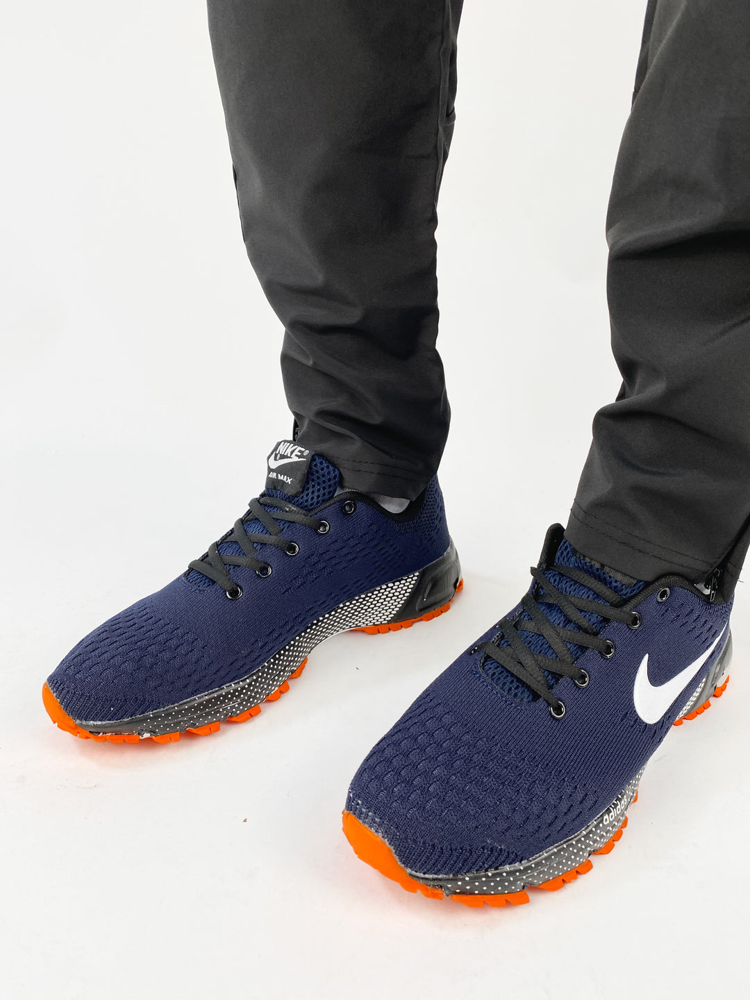 Nike air max navy blue trainers with waffle orange sole