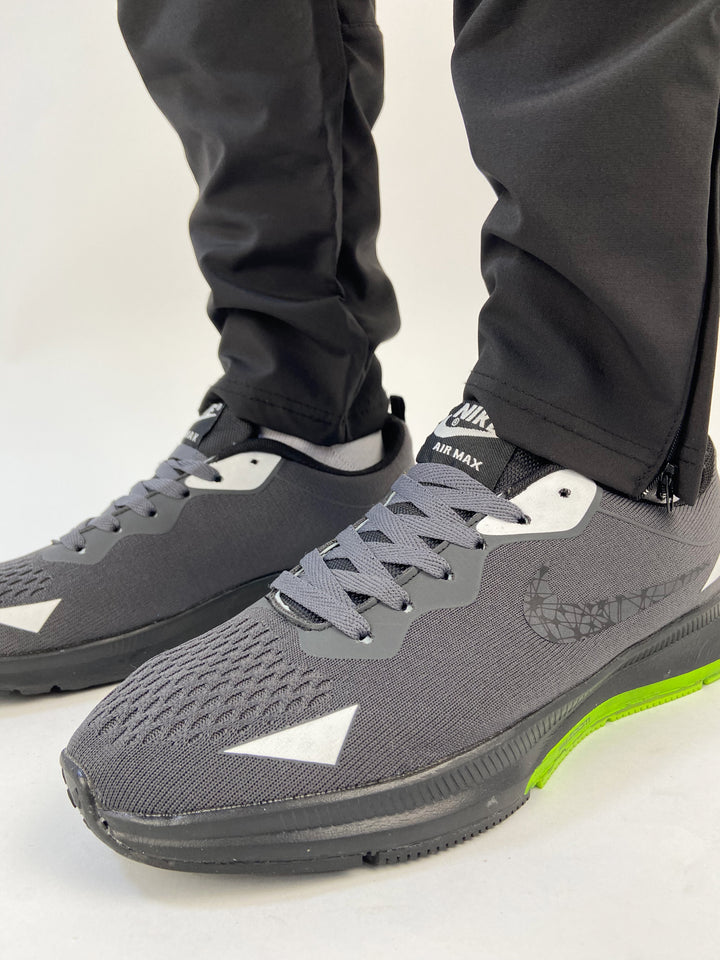 Nike air max trainers in black&lime sole
