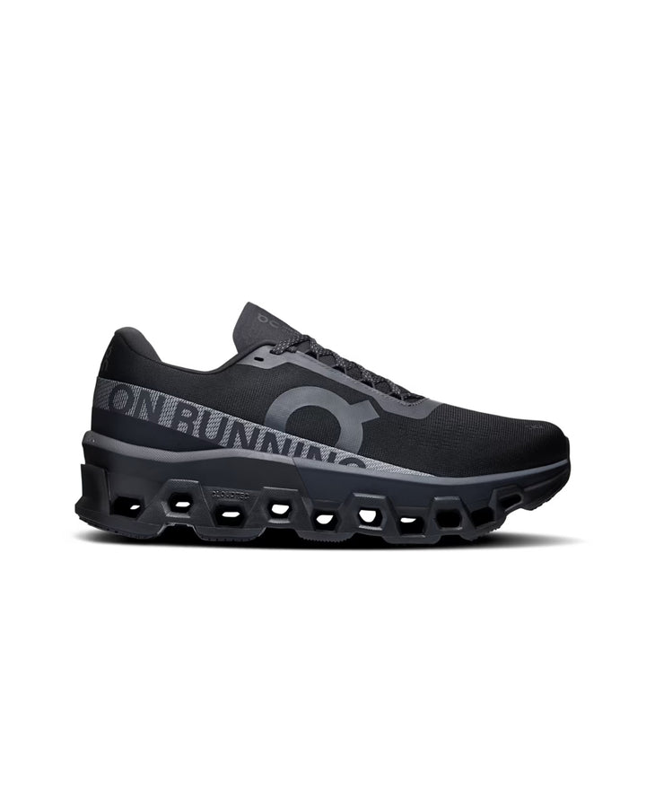 ON Cloudmonster running trainers in black